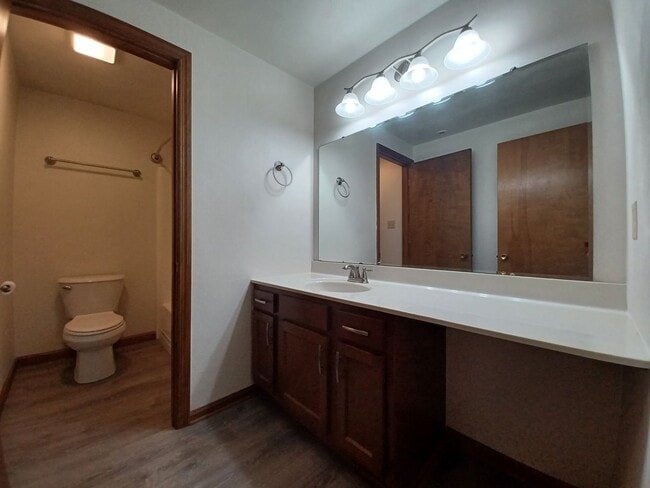 Building Photo - Lovely 2 Bedroom Townhouse with Private Patio, Off-Street Parking & MORE! Call Today!!