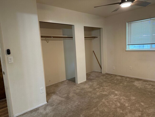 Building Photo - Charming Redding Home with Fireplace & Vau...