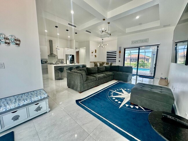 Building Photo - Fully Furnished Annual Rental- 3 Bedroom 2 Bathroom - Pool and Waterfront- NE CAPE CORAL