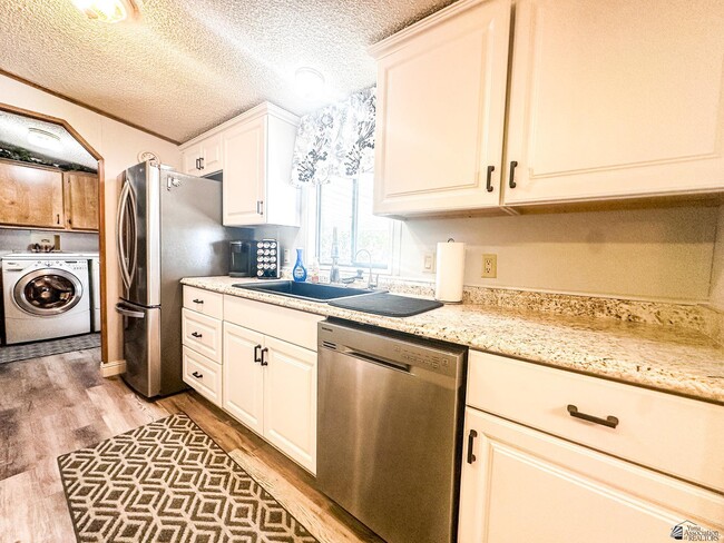 Building Photo - 13240 E 50th Dr