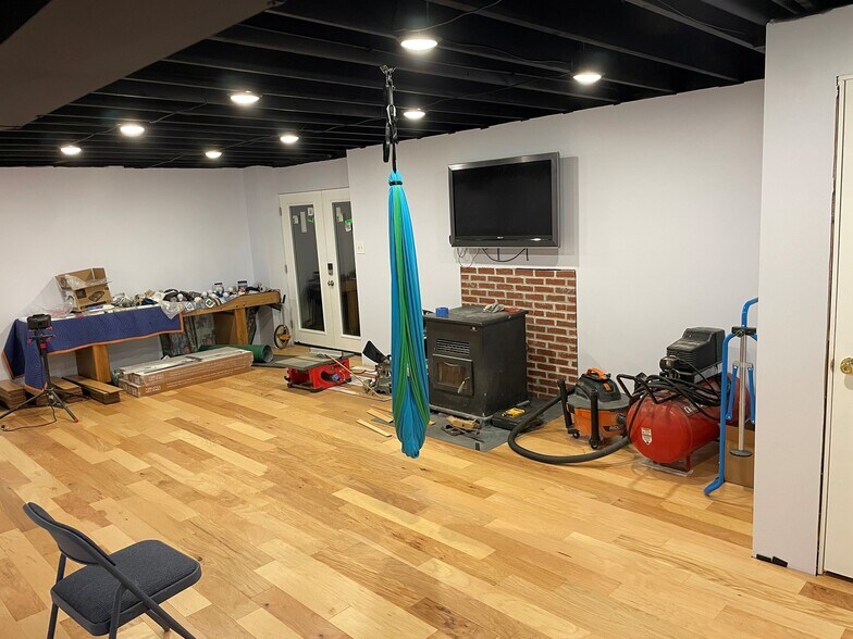 Common Area walk thru to basement door - 205 Palomino Dr