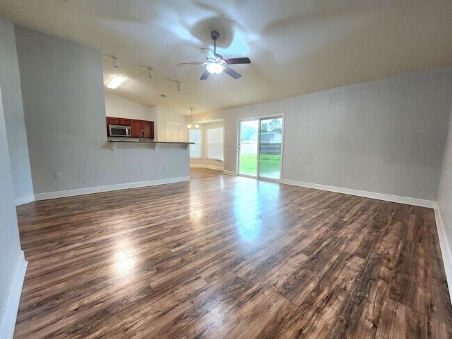 Building Photo - Welcome to your 4/2 dream home in Pace Mil...