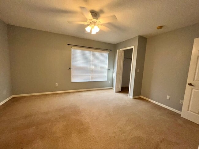 Building Photo - AVAILABLE NOW! Charming 2 Beds 2.5 Bath Townhome! 2 MASTER SUITES! Attached one car garage!! Extr...