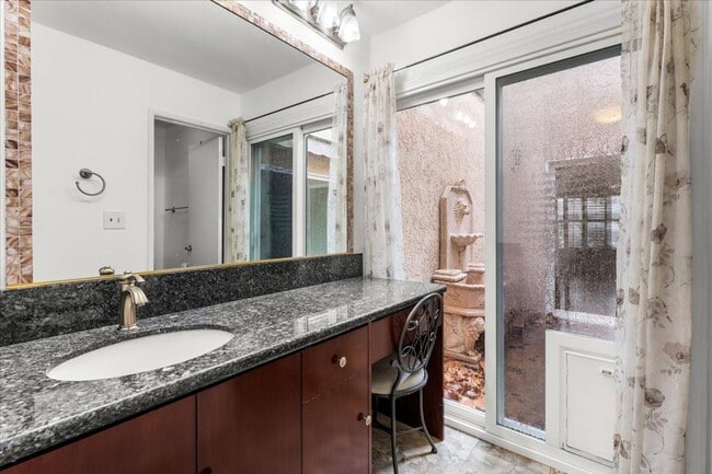 Building Photo - Private Street-Access Condo with Garage, Courtyard, Pool and Tennis