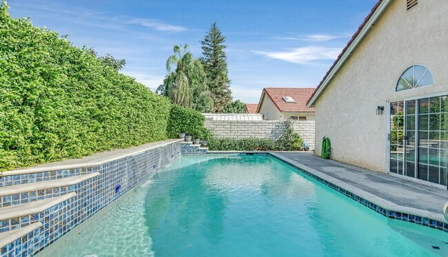 Building Photo - Your Summer Oasis Awaits – Charming Home with Pool!