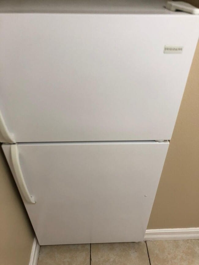 Building Photo - Green Tee - # 317