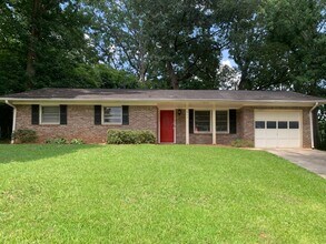 Building Photo - Wow! Beautiful brick 3 bedroom 2 bathroom ...