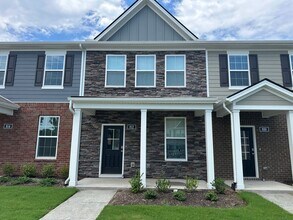 Building Photo - BRAND NEW TOWNHOME!