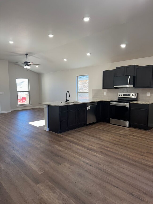 Building Photo - Brand New Construction 3/2/2  1/2 off spec...