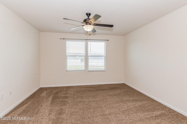 Building Photo - 15697 Saddled Charger Dr