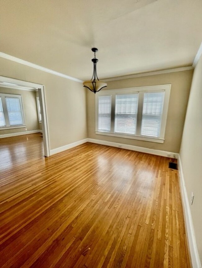 Building Photo - Introducing WesleyHeights401, a charming 3...