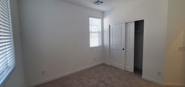 Building Photo - Beautifully designed modern townhome with attached garage.