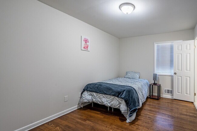 Building Photo - The Forest Haven | Large Forest Haven home with a spacious yard and deck, conveniently located ju...
