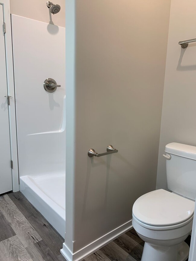 Building Photo - Walkout ranch townhome with 2 stall garage...