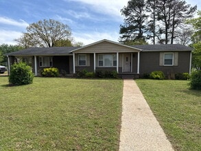Building Photo - Will consider Section 8 "Charming 4-Bedroom Home with Hardwood Floors on Ready Section Road!"