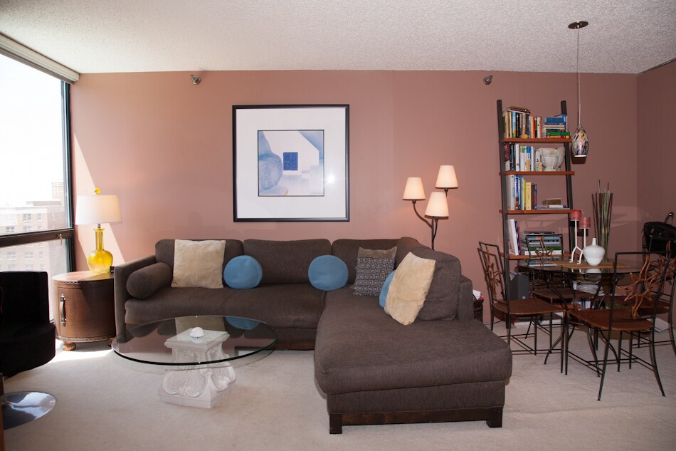 Living room just painted a light color. Photo shows sectional sofa, table/chairs - 1122 N Clark St