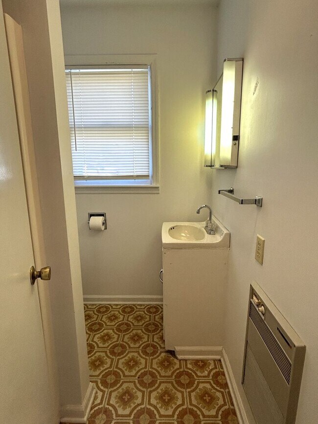 Building Photo - Large Brick Ranch with Finished Basement a...