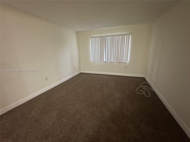 Building Photo - 4235 N University Dr