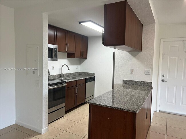 Building Photo - 8950 SW 69th Ct