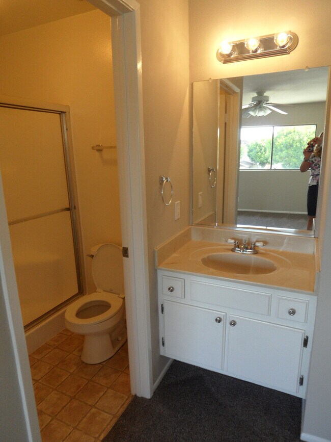 Building Photo - Two Story 4 BR 2.5 BA Condo With 2 Car Garage