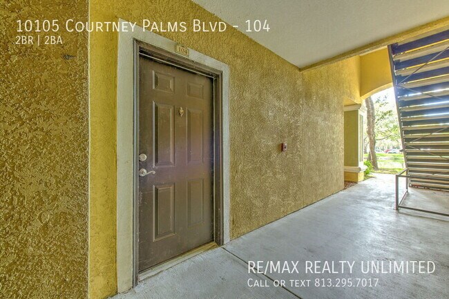 Building Photo - 10105 Courtney Palms Blvd