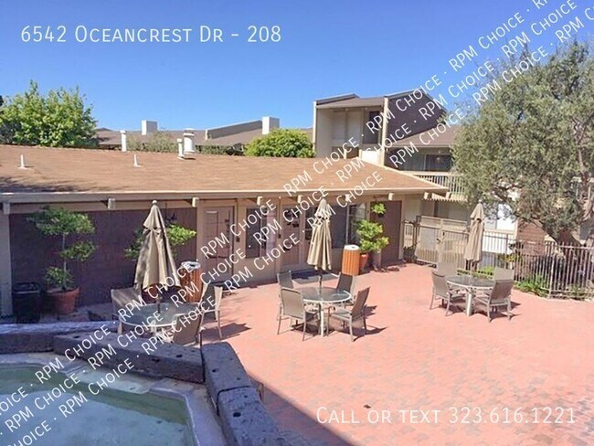 Building Photo - 6542 Oceancrest Dr-208