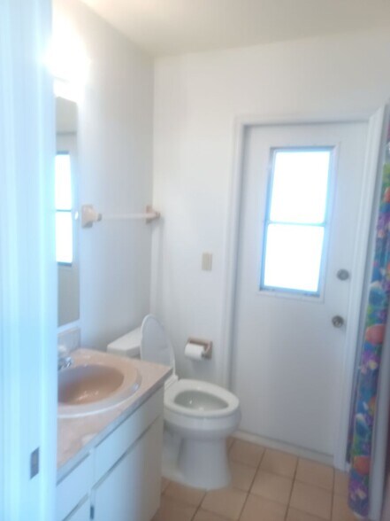 Building Photo - COMING SOON: Spacious Gulf Access 3 BR / 3 BA Home With a Large Screened Lanai for Entertaining &...