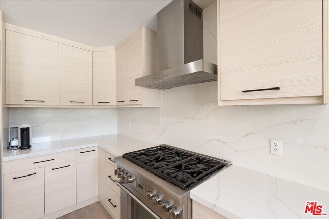 Building Photo - 11700 Woodley Ave