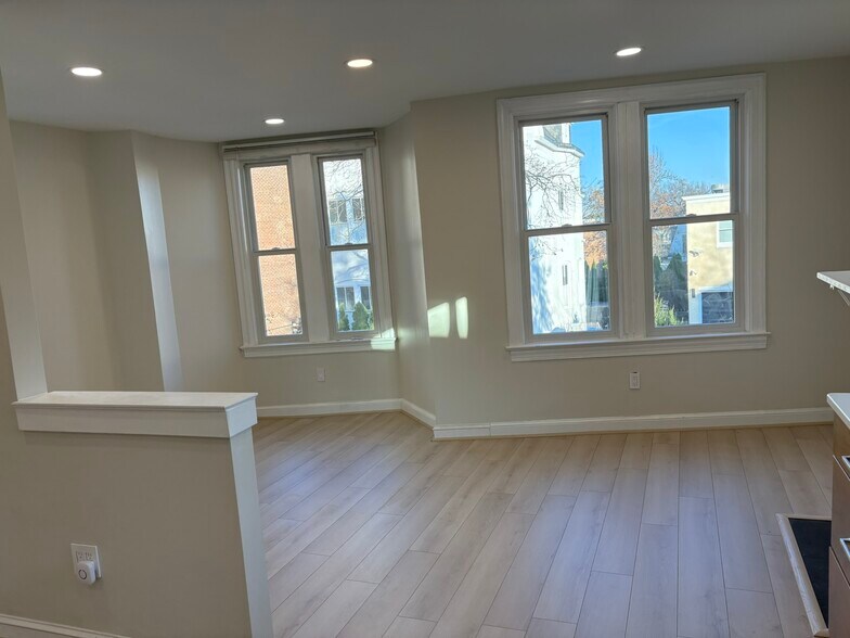 Plenty of windows and dedicated living and dining spaces - 1514 31st St NW