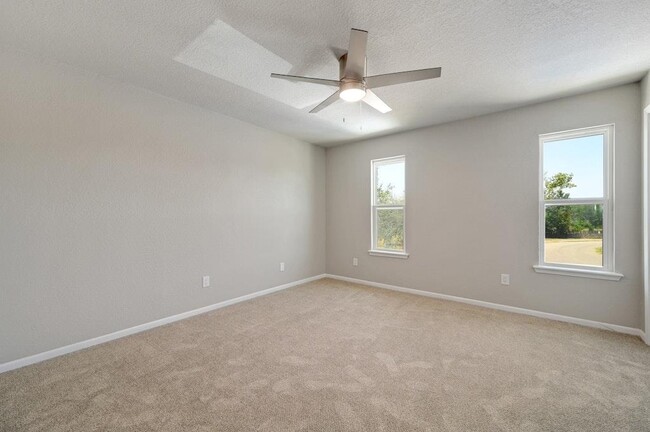 Building Photo - 10 Cypress Fairway Village