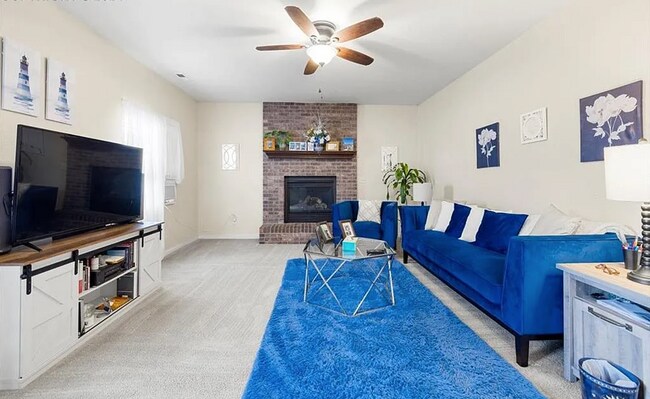 Building Photo - Spacious 5-Bedroom Home with Bonus Entertainment Room & Low-Maintenance Yard