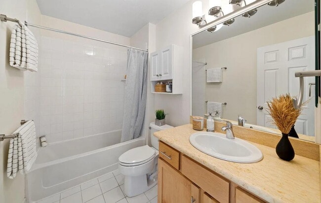 Building Photo - 1 bedroom plus loft features a functional floorplan with high ceilings