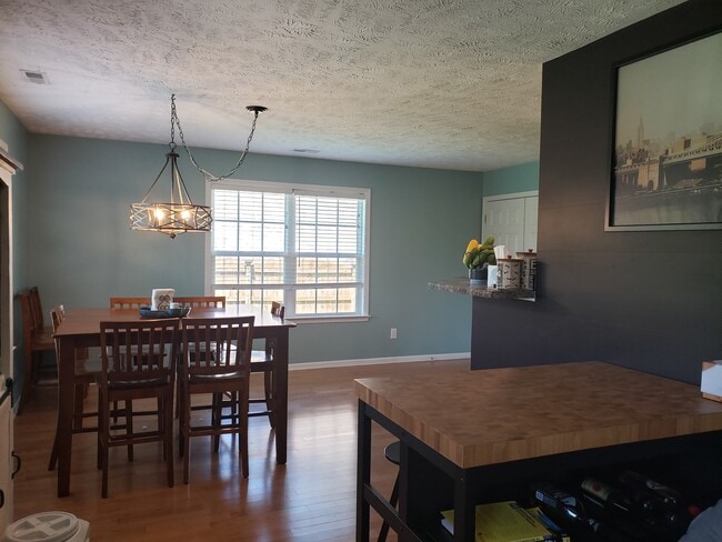 Very large dining area and washer, dryer behind double doors inside the house. - 820 Laramie Ct