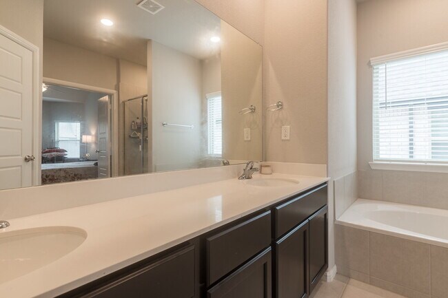 Building Photo - Gorgeous Two Story Home Featuring 2 Living spaces, 5 Bedrooms, and 3.5 Baths