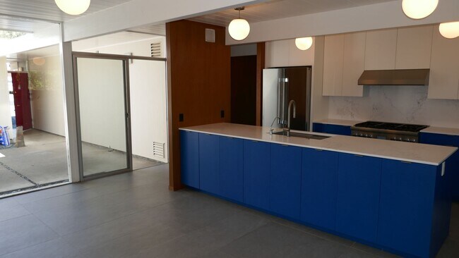 Building Photo - BEAUTIFUL UPDATED FOUR BED / TWO BATH PLUS OFFICE EICHLER HOME WITH GREAT OUTDOOR SPACE