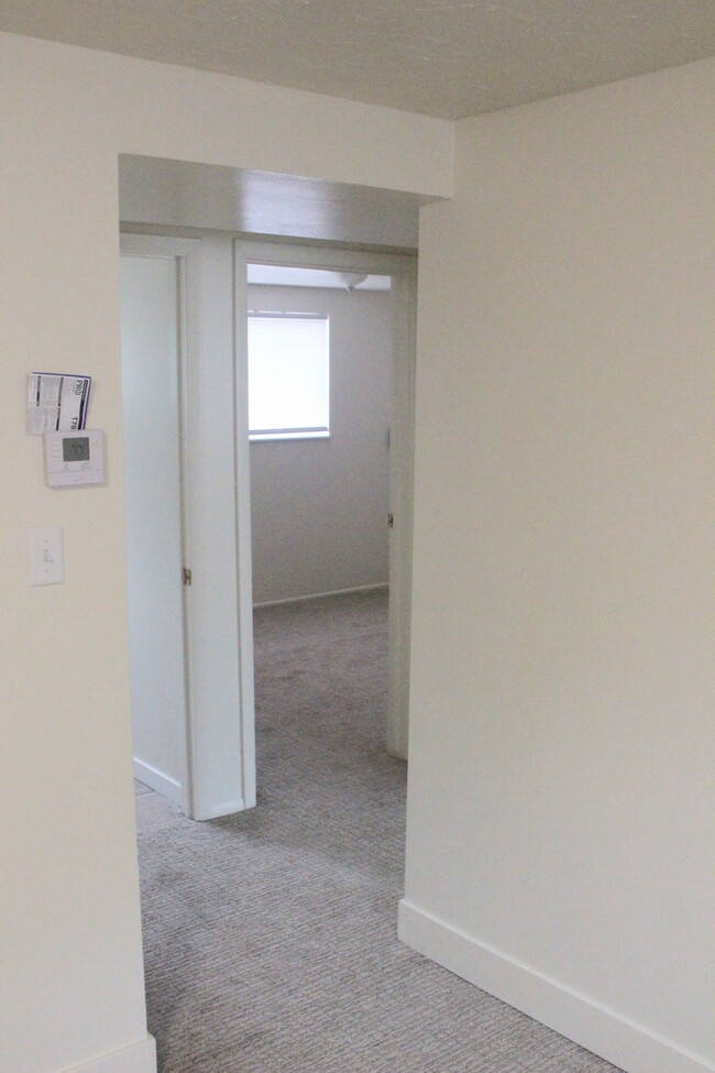 Hall leading to bedrooms. - 338 E 1600 S