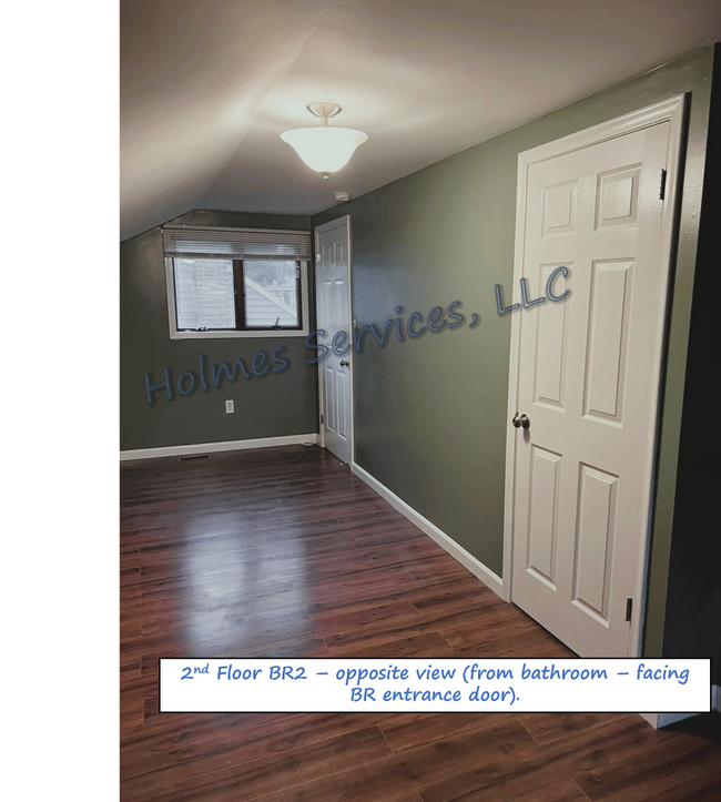 Upper BR2 - great windows for air circulation, lots of closet space & access to attic storage - 619 S Gainsborough Ave