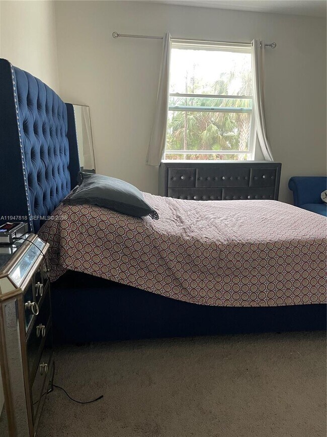 Building Photo - 6157 NW Gatun Dr