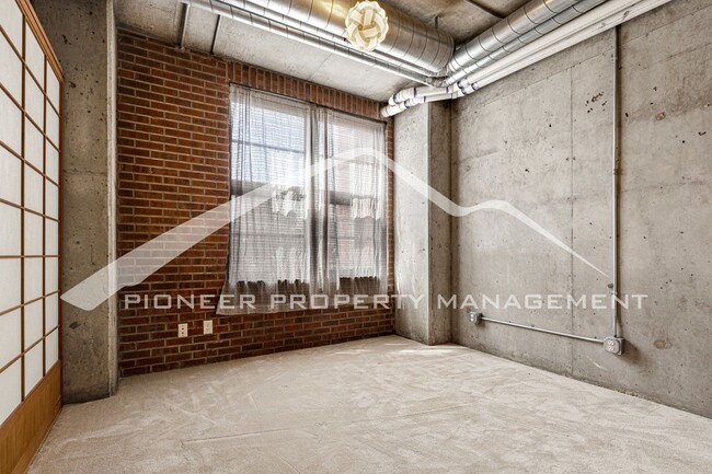 Building Photo - Modern Industrial Condo Downtown with Park...
