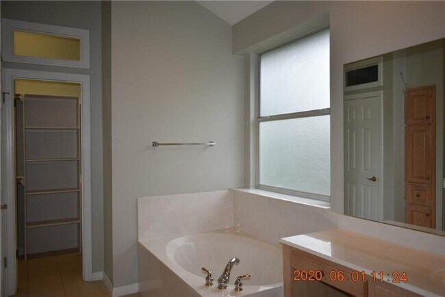 Building Photo - 10016 Liriope Cove