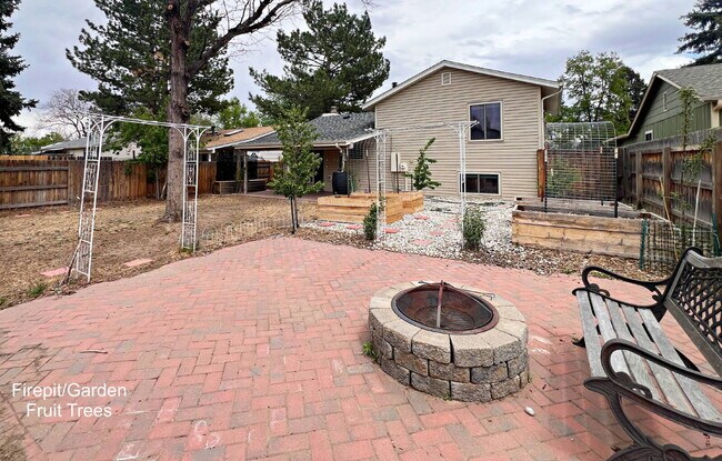 Building Photo - Charming Aurora Retreat with Gardener's Paradise Backyard - Pet Friendly