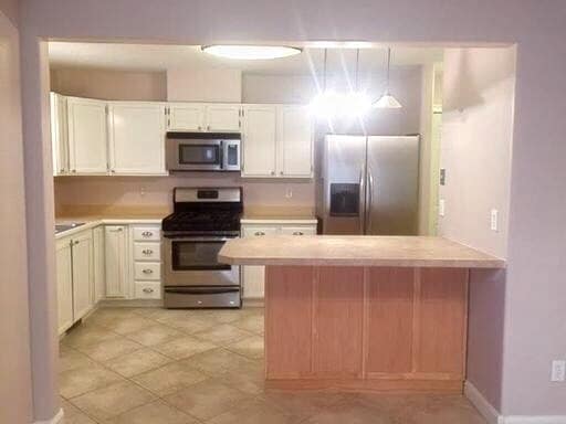 Building Photo - Spacious East Anchorage Home with Yard & Garage!