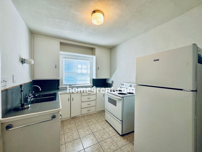 Building Photo - First Level Condo, Just Off the Plaza with...