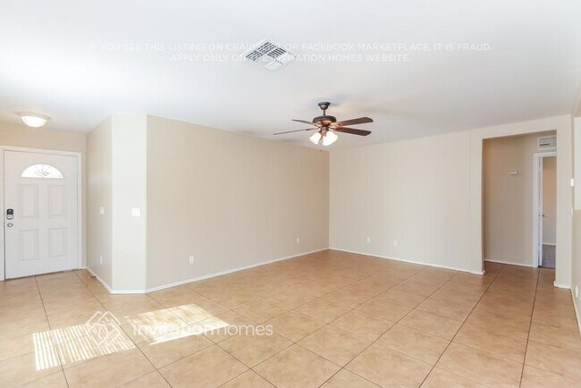 Building Photo - 6050 W Pueblo Ave