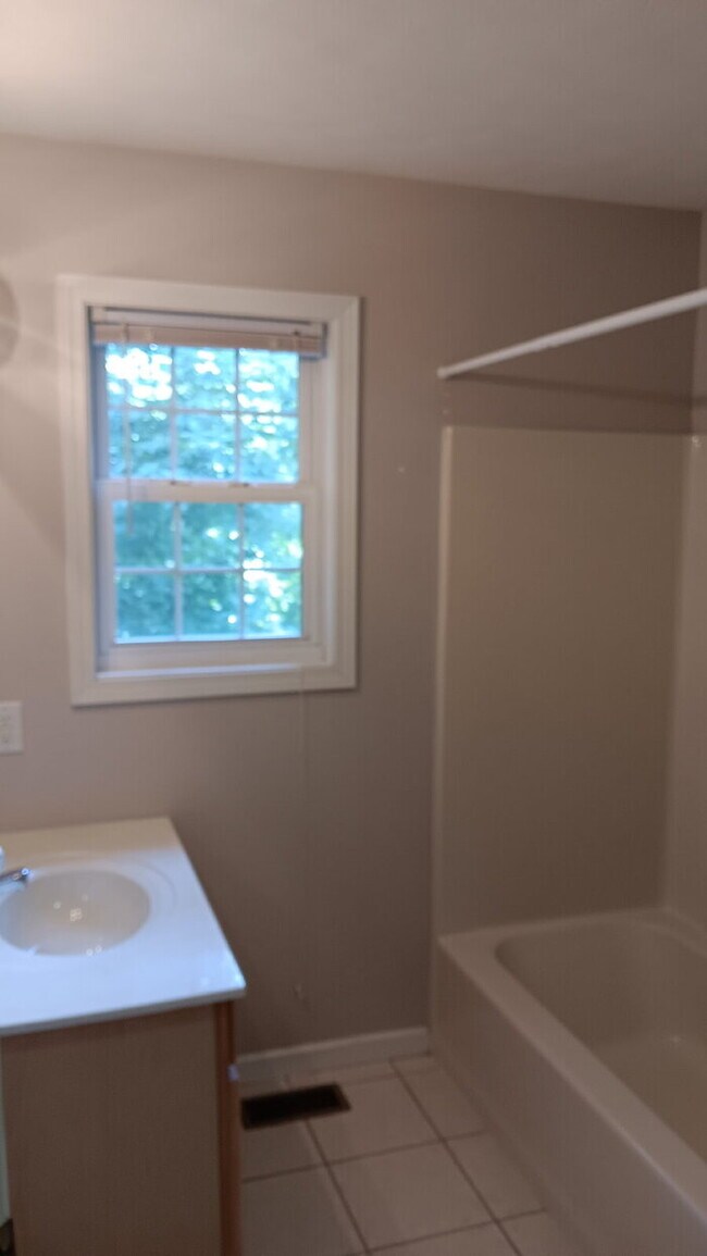 Building Photo - 3BR, 2.5BA end unit available August 1, 2025