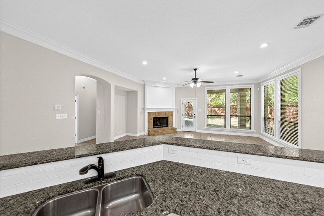 Building Photo - Corner Homesite. Gated Community. 4 Bedroom 1 Story with Formal Dining and Formal Office