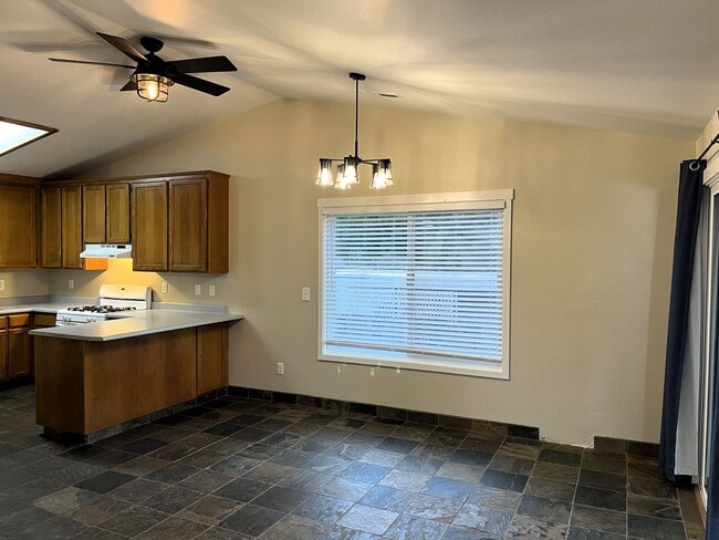 Building Photo - Newley updated 3-bedroom home features fen...