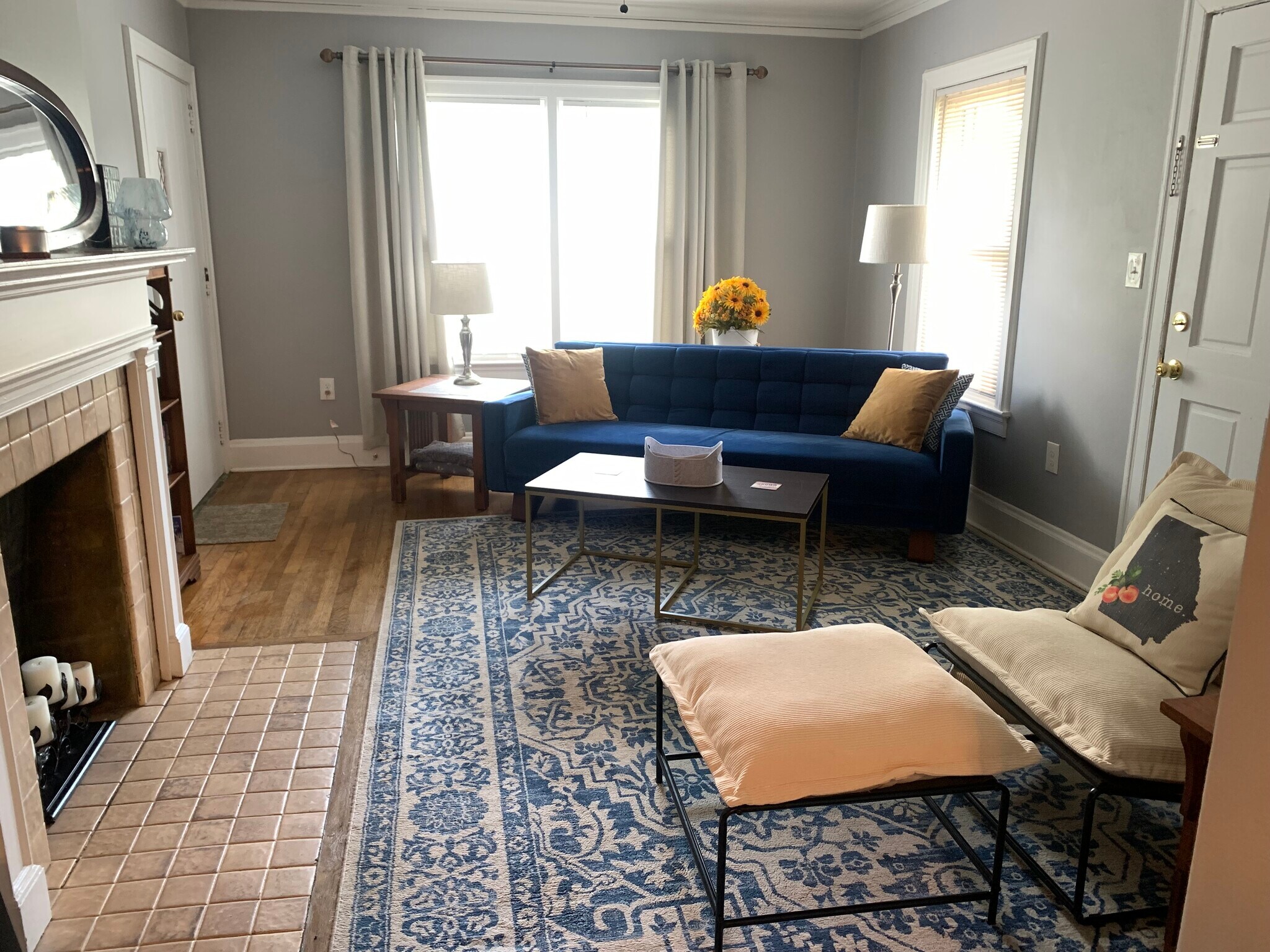 living room: smart TV, AC/heat, door to private porch - 1411 Winburn Dr