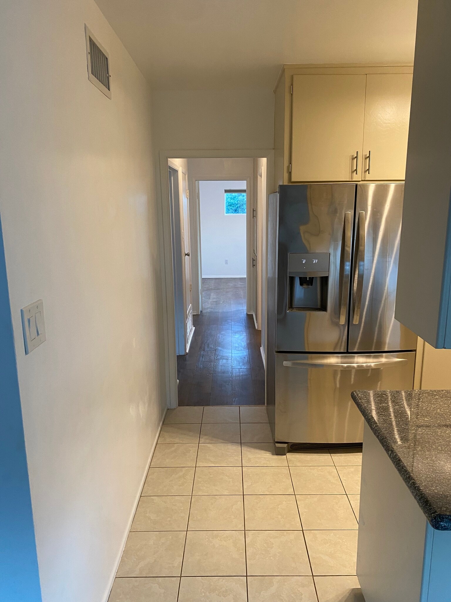 Kitchen and hallway to bed and bath rooms - 6716 Pollard St