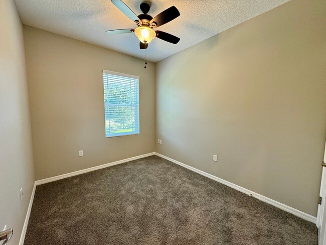 Building Photo - Move in ready 3/2 New Construction Townhou...